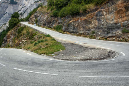 L'Alpe d'Huez, France - August 19, 2019: Ascent of the famous climb to L'Alpe d'Huez and itinerary of the Tour de France at bend 20のeditorial素材