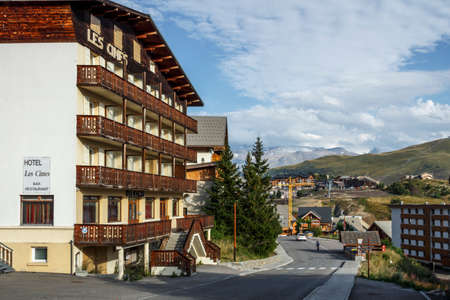 L'Alpe d'Huez, France - August 19, 2019: Ski resort L'Alpe d'Huez with hotels and other buildingsのeditorial素材