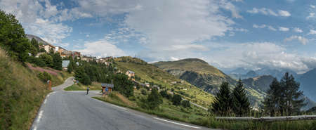 L'Alpe d'Huez, France - August 19, 2019: Ascent of the famous climb to L'Alpe d'Huez and itinerary of the Tour de Franceのeditorial素材
