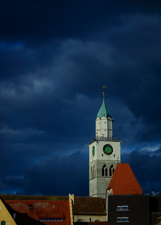 Like a bad omen there are black clouds over the Ueberlingen Muenster.の写真素材