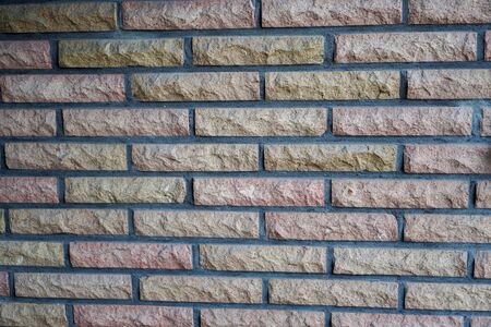 Yellow brick wall as a background