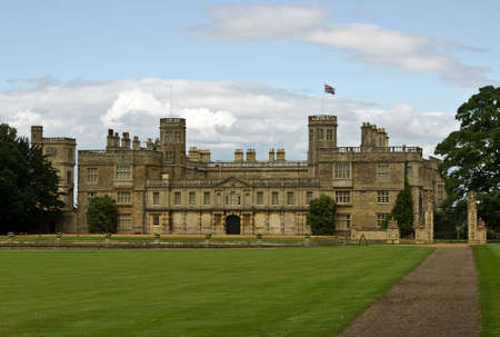 A view of Castle Ashby, Northamptonshire flying a Union Jack