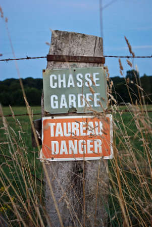 Some classic French warning signs at duskの写真素材