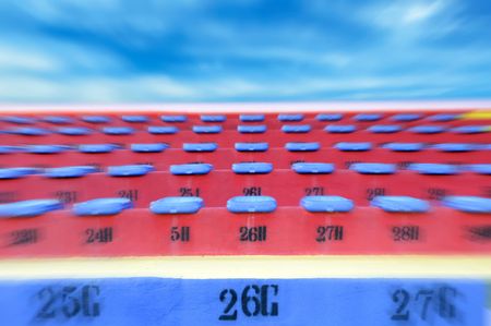 empty seats In rows on outdoor stadiumの写真素材