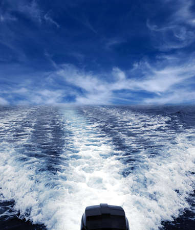 white wake of a boat motorの写真素材