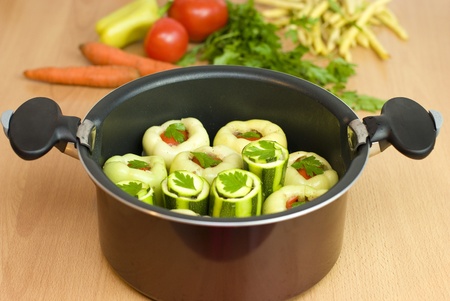pan with stuffed peppers and zucchini