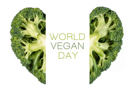 World Vegan Day poster design with heart-shaped broccoli cut through the center to accommodate the central text over a white backgroundの写真素材