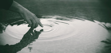 Beauty and aged skin care concept with a beautiful woman doing skincare routine with gua sha tool. Middle aged female using guasha. Massage for facial lifting. white background bannerの写真素材