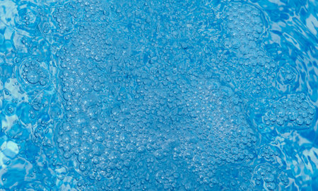 Bubbly water. Blue abstract background