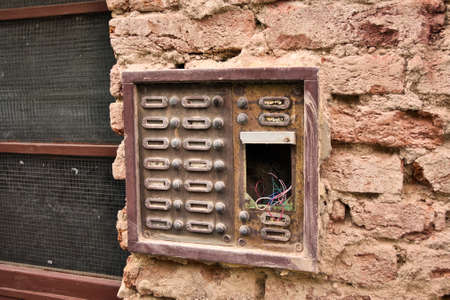 Broken Bells on a brick wallの写真素材