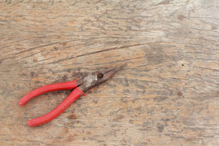 pliers on wood