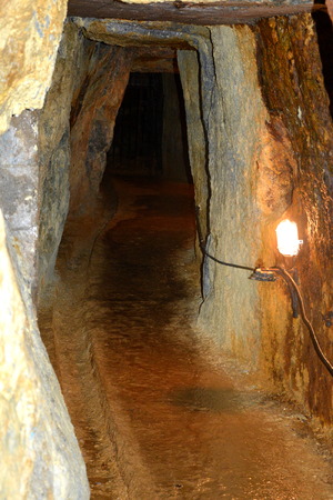Roman tunnel in the village Rosia Montana, gold mine, Transylvania. Rosia Montana is a commune of Alba County in the Apuseni Mountains of western Transylvania, Romania.The rich mineral resources of the area have been exploited since Roman times or before.のeditorial素材