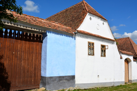 Typical houses in the village Viscri, Transylvania. .Viscri is known for his fortified church. The fortified church in this village was built around 1100 AD. It is part of a area if villages with fortified churches in Transylvania.のeditorial素材