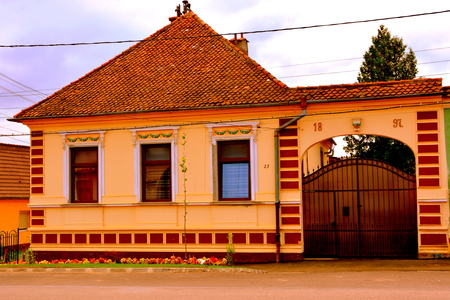 Tipical house in the village Codlea.  The fortified church in the city Codlea is the largest in the Burzenland historic region. During the 13th century, the Teutonic Order built a fortress known as Schwarzburg (black castle) near the Magura Codlei. The caのeditorial素材