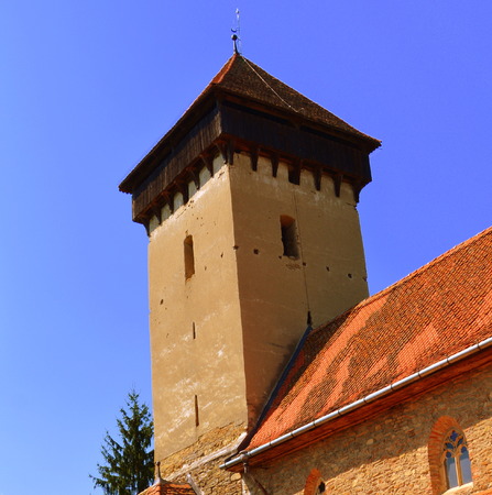 Fortified medieval church in the village Malancrav, Transylvania. Here some of the most significant Gothic murals in Transylvania. The Saxon Romanesque Lutheran church has early 14th-century Gothic murals in the apse. 15th-century ones are found in the naのeditorial素材
