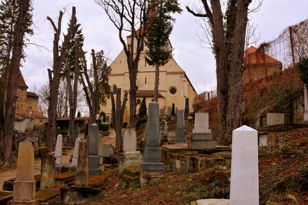 Cemetery. Old medieval saxon lutheran church in Sighisoara, Transylvania, Romaniaの写真素材