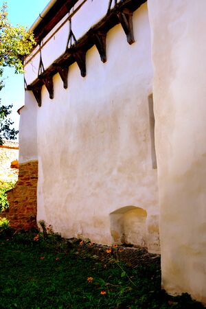 Fortified medieval saxon church in Cincsor-Kleinschenk, Sibiu county.  The church with a tower on the west is built in 1427. In the middle of the 15th century the first enclosure was erectedの写真素材