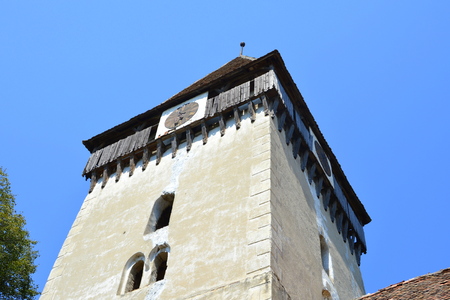 Tower. Fortified medieval saxon evangelic church in the village of Toarcla, Tartlau, Transylvania, Romania. The settlement was founded by the Saxon colonists in the middle of the 12th centuryのeditorial素材