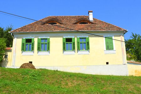 Typical rural landscape and peasant houses in Bruiu - Braller, municipality of Sibiu County, Transylvania, Romania. The settlement was founded by the Saxon colonists in the middle of the 12th centuryのeditorial素材