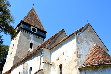 Fortified medieval saxon evangelic church in the village Toarcla, Tartlau, Transylvania, Romania. The settlement was founded by the Saxon colonists in the middle of the 12th centuryのeditorial素材