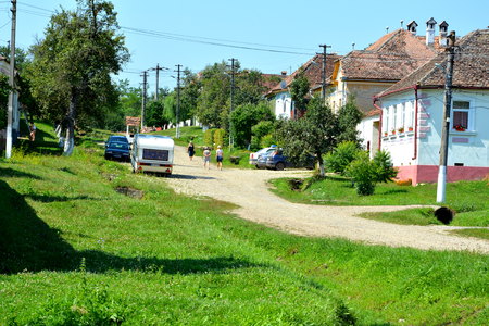 Typical rural landscape and peasant houses in  the village Toarcla, Tartlau, Transylvania, Romania. The settlement was founded by the Saxon colonists in the middle of the 12th centuryのeditorial素材