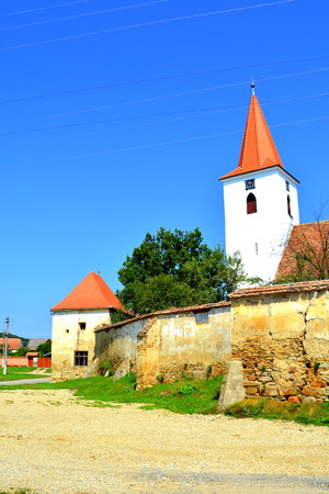 Fortified medieval saxon church in Bruiu - Braller, a commune in Sibiu County, Transylvania, Romania. The settlement was founded by the Saxon colonists in the middle of the 12th centuryの写真素材