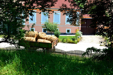 Typical rural landscape in Veseud, Zied, a village in the commune ChirpÄr from Sibiu County, Transylvania, Romania, first attested in 1379. Peasant housesの写真素材