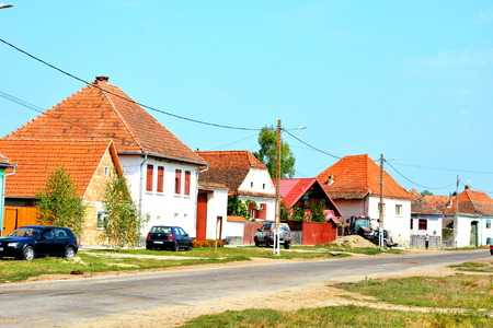 Typical rural landscape and peasant houses in  the village Mercheasa, Transylvania, Romania. The settlement was founded by the Saxon colonists in the middle of the 12th centuryのeditorial素材