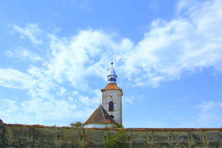 Fortified medieval saxon evangelic church in the village Mercheasa, Transylvania, Romania. The settlement was founded by the Saxon colonists in the middle of the 12th centuryの写真素材