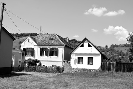 Typical rural landscape and peasant houses in  V?rd,Wierd, Viert, a saxon village in the commune Chirp?r from Sibiu County, Transylvania, Romania.のeditorial素材