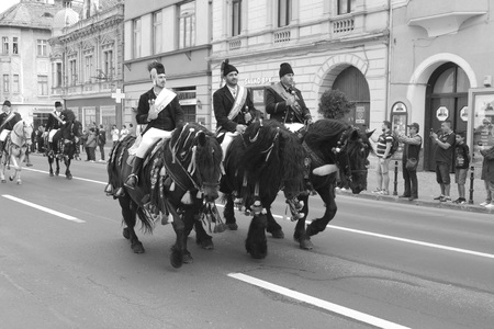 Brasov, Transylvania, Romania, April 15 2018, Riders celebrating of the day so call Juni Parade. A millennial  christian romanian tradition.のeditorial素材