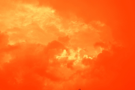 White clouds in a blue sky in a cloudy summer day
