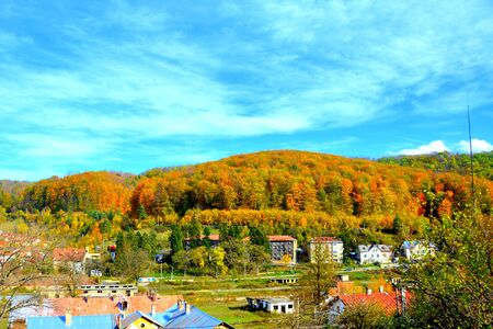 View of the mining town Anina. Typical landscape in the forests of Transylvania, Romania. Green landscape in the midsummer, in a sunny dayの写真素材