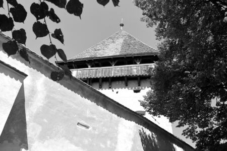 Fortified medieval saxon evangelic church  in  the village Alma Vii (Almen) Transylvania, Romania. The settlement was founded by the Saxon colonists in the middle of the 12th centuryのeditorial素材