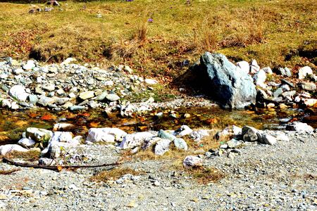 Piatra Craiului in Carpathian Mountains, Transylvania. Typical landscape in the forests of  Romania. Green landscape in spring, in a sunny dayの写真素材