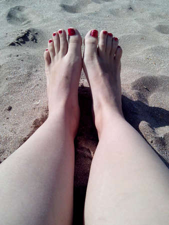 Feet in the sandの写真素材