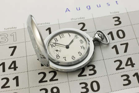 Clock and a calendar close-up