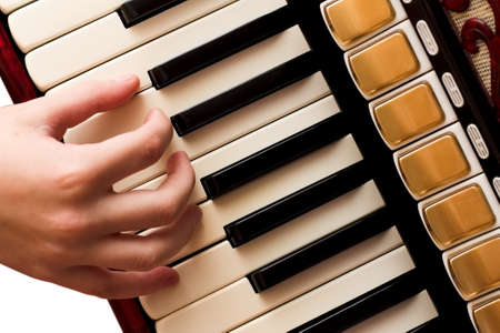 Hand playing accordion closeupの写真素材