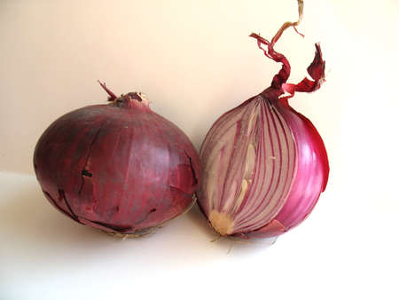 This is section of a large onion and an onionの写真素材
