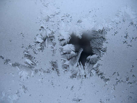 This is frosty pattern on glass winter window