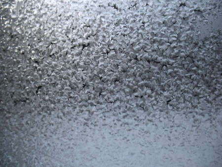 This is frosty pattern on glass winter window