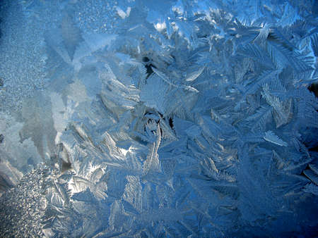 frosty pattern on glass winter window