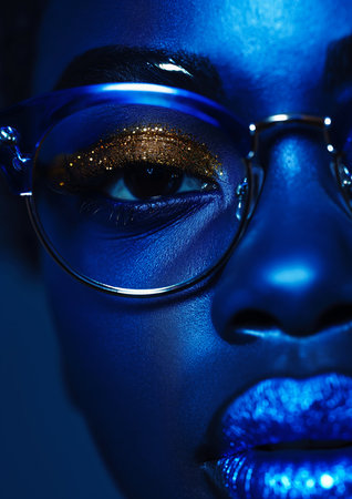 closeup woman blue makeup glasses gold skin impactful color flares shimmer bright, generative aiの素材