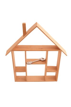 wooden house-construction on white backgroundの写真素材
