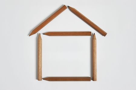 pencils construction of small  houseの写真素材