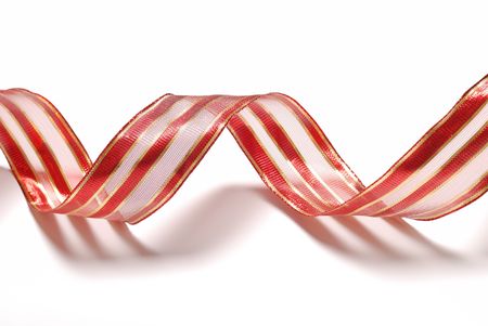 Festive Christmas  decoration. curl ribbon isolated on whiteの写真素材
