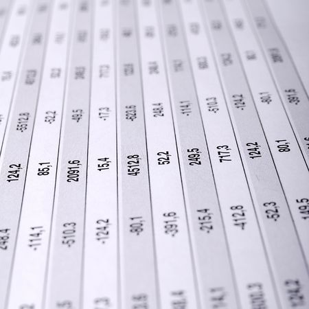 financial chart  on a newspaper page. numeral signs an penの写真素材