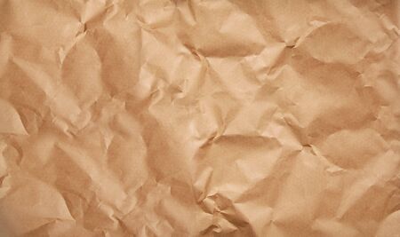crumpled and wrinkled grunge paper background or backdropの写真素材