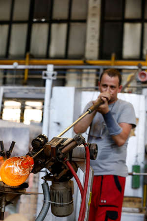 KARLOVY VARY, CZECH REPUBLIC - JUNE 01, 2017 - Glass blowers demonstrate their craft, a popular tourist attraction in Bohemia regionのeditorial素材