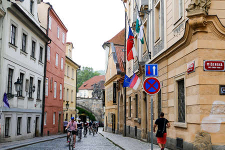 Prague, Czech Republic -  may 31, 2017 - tourist with bike in historic old downtown of Pragueのeditorial素材